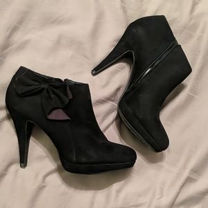 Black suede booties with bow